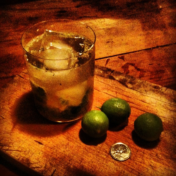 Mojito made with Key limes, Canadian quarter for scale.