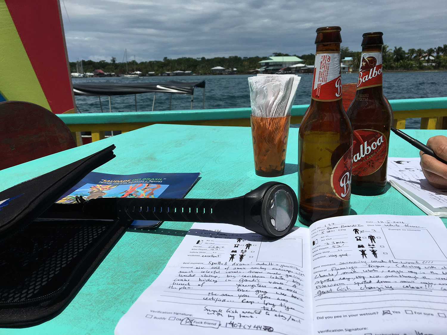 The age old ritual, logbooks and beers.